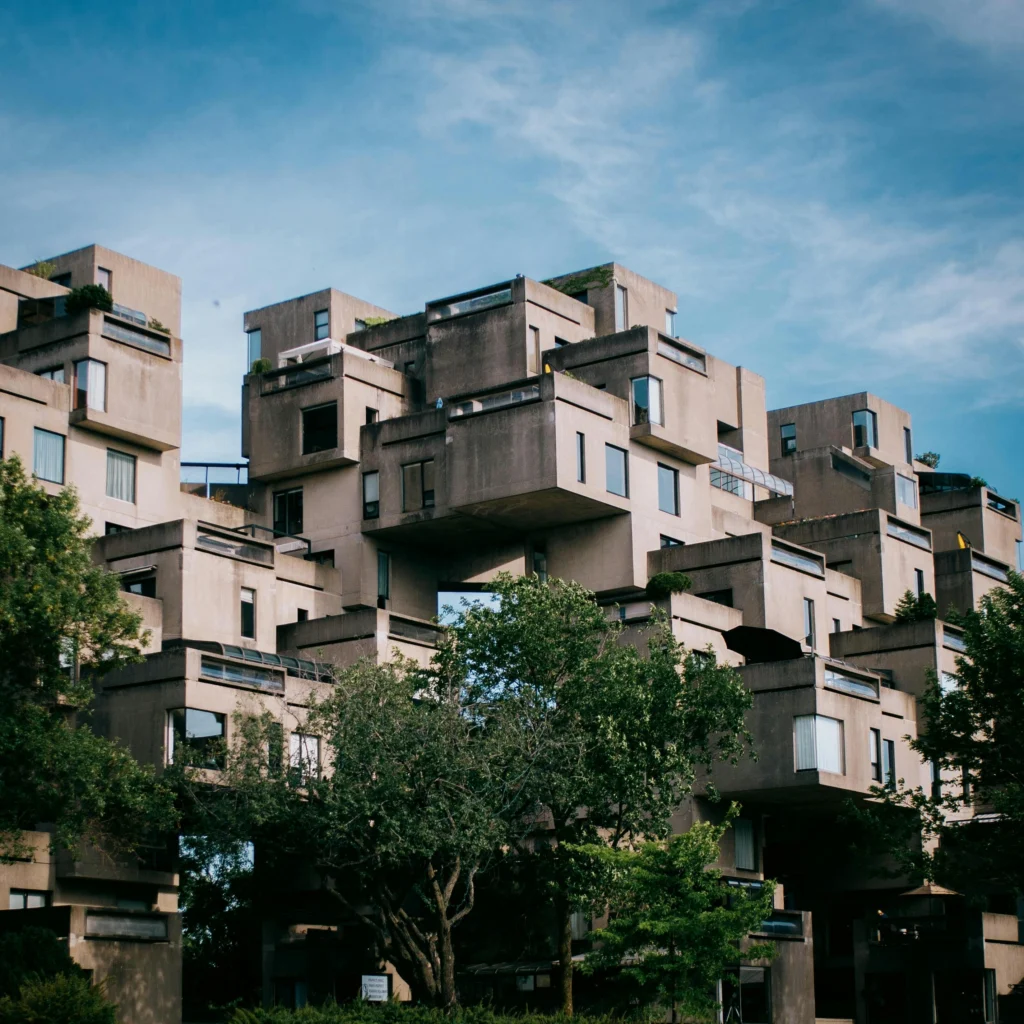 Habitat 67 with stacked concrete units and terraces.